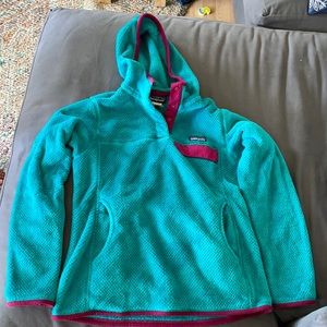 Women’s synchilla turquoise with magenta.